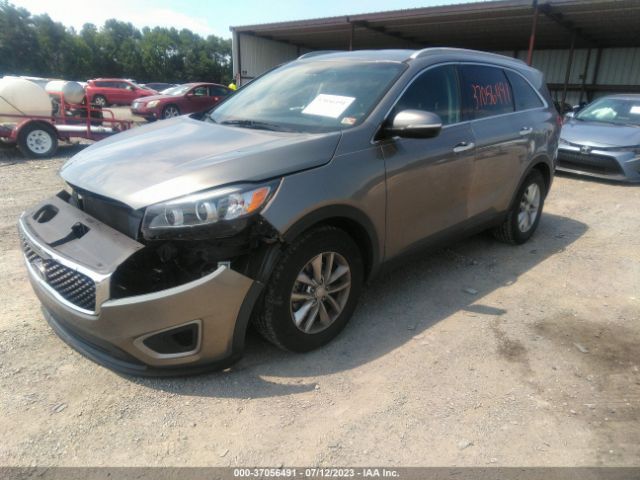 5XYPG4A59GG033711 KIA SORENTO LX