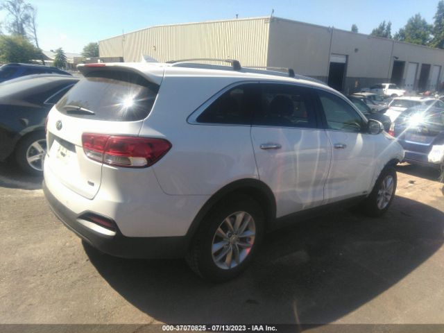 5XYPGDA35JG353436 KIA SORENTO LX