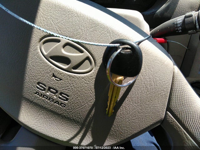 2005 HYUNDAI ACCENT GLS/GT VIN: KMHCG35C65U332498