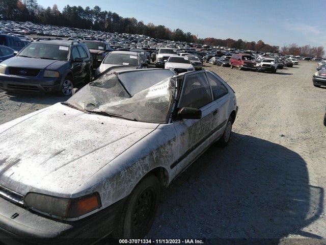 1994 MAZDA 323 VIN: JM1BG2322R0800681