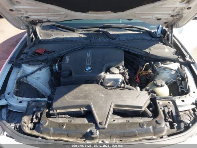 WBA3C1C5XEK105851 BMW 3 Series 328i