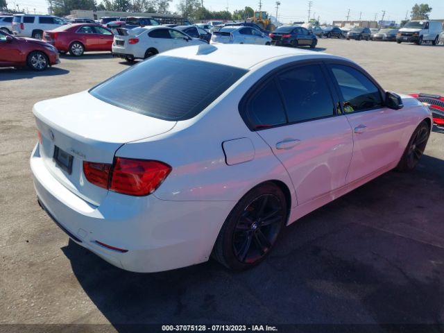 WBA3C1C5XEK105851 BMW 3 Series 328i