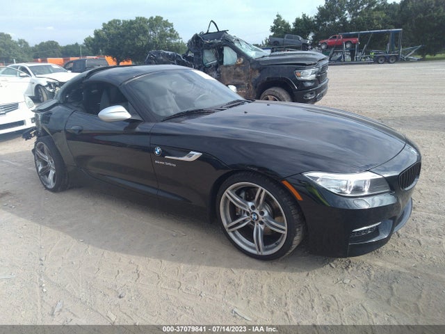 2016 BMW Z4, VIN: WBALM1C51GE634748