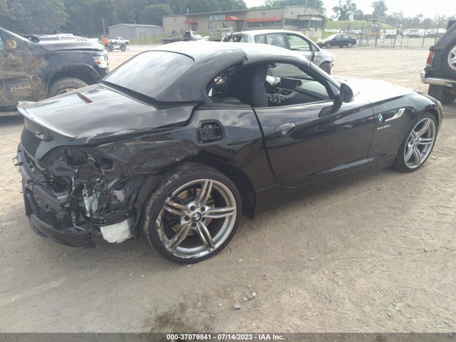 2016 BMW Z4, VIN: WBALM1C51GE634748