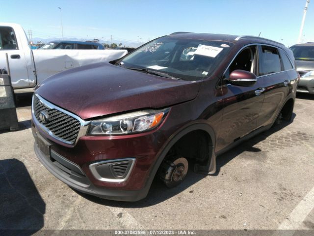 5XYPG4A34GG125615 KIA SORENTO LX