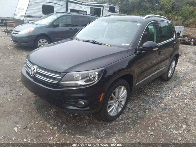 2013 VOLKSWAGEN TIGUAN SE W/SUNROOF & NAV VIN: WVGAV7AX0DW512284