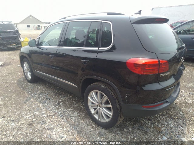 2013 VOLKSWAGEN TIGUAN SE W/SUNROOF & NAV VIN: WVGAV7AX0DW512284