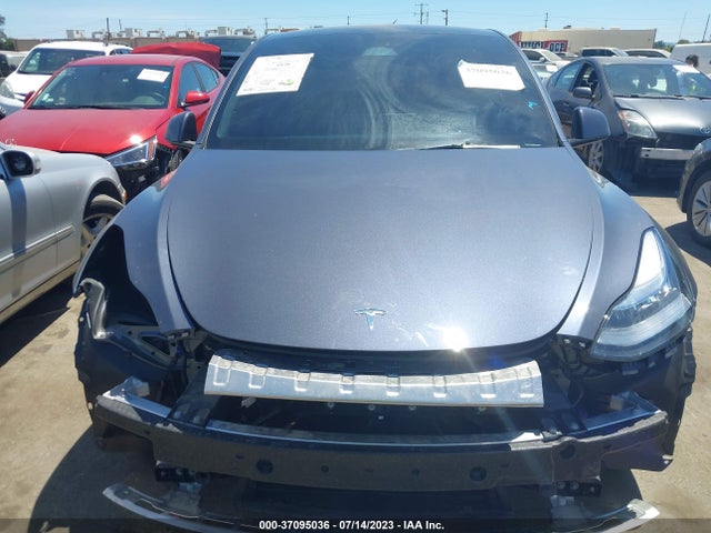 Tesla Model Y Long Range 2023 7SAYGDEE5PA124870 Image 4