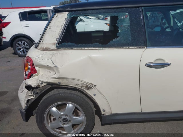 2010 MINI COOPER HARDTOP VIN: WMWMF3C56ATZ62082