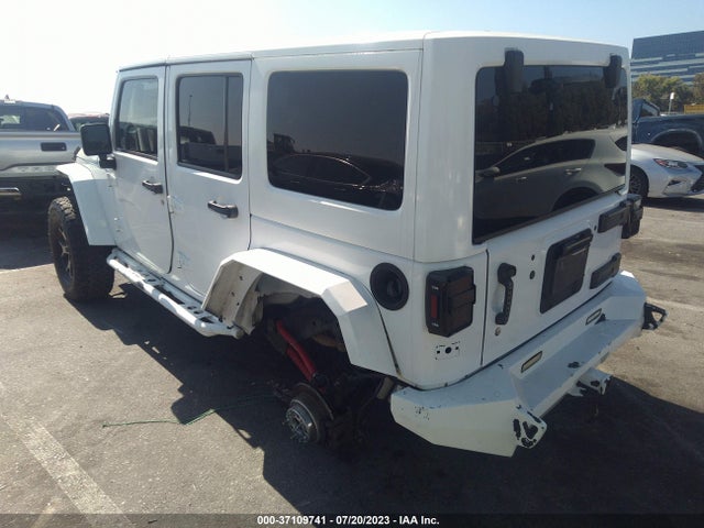 1C4HJWDG9EL235366 Jeep Wrangler Unlimited Sport