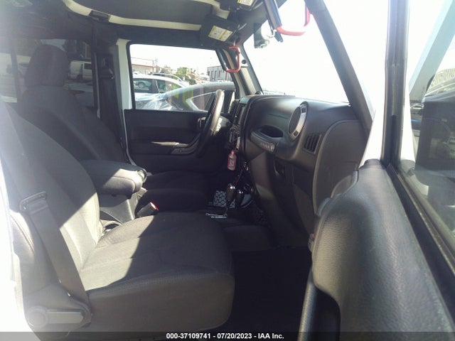 1C4HJWDG9EL235366 Jeep Wrangler Unlimited Sport
