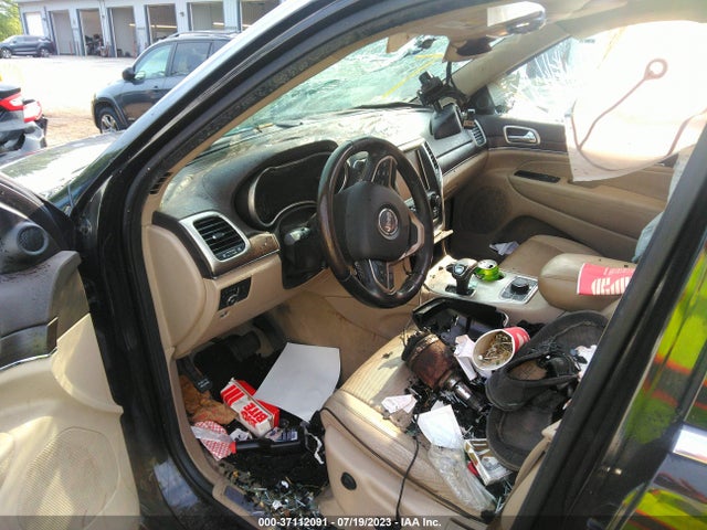 2014 JEEP GRAND CHEROKEE OVERLAND VIN: 1C4RJFCG7EC219902