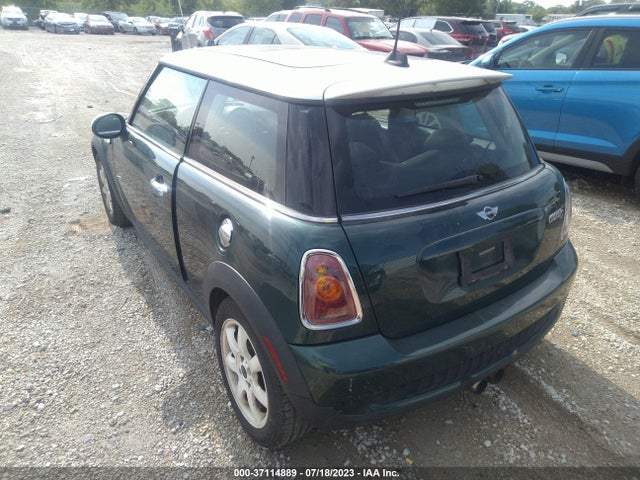 2010 MINI COOPER S WMWMF7C57ATZ73406 Photo 2