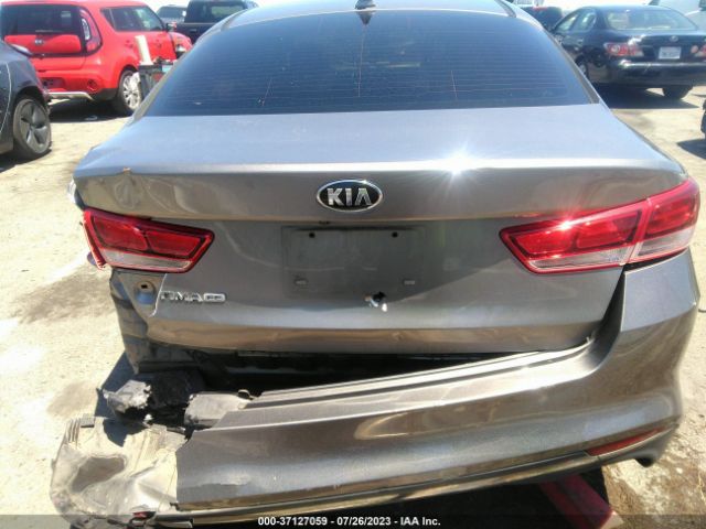 5XXGT4L38GG090588 KIA Optima Lx