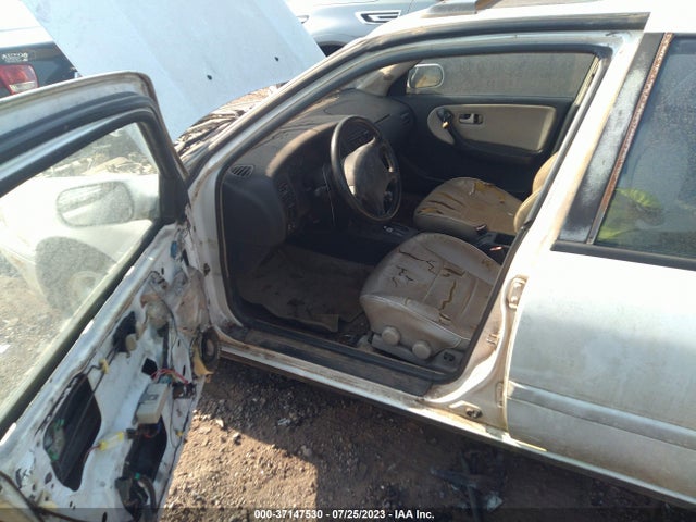 1994 INFINITI G20 VIN: JNKCP01D3RT504465