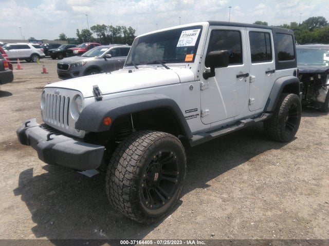 1C4BJWDG1FL711049 Jeep Wrangler Unlimited Sport