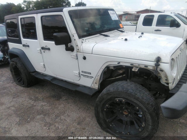1C4BJWDG1FL711049 Jeep Wrangler Unlimited Sport