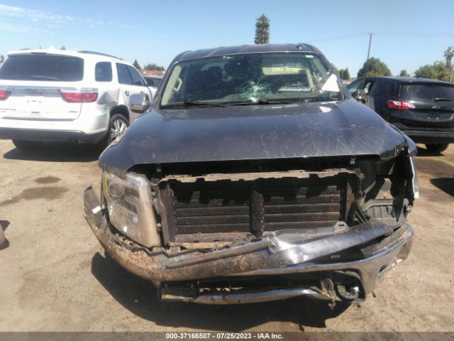 1N6AA1E5XKN530118 Nissan Titan Sl
