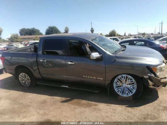 1N6AA1E5XKN530118 Nissan Titan Sl