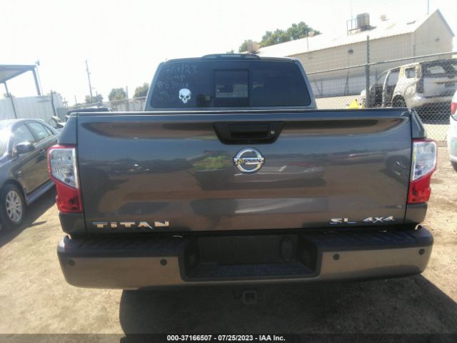 1N6AA1E5XKN530118 Nissan Titan Sl