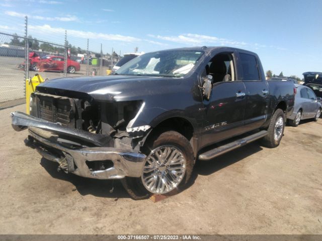 1N6AA1E5XKN530118 Nissan Titan Sl