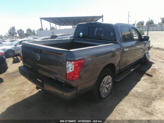 1N6AA1E5XKN530118 Nissan Titan Sl