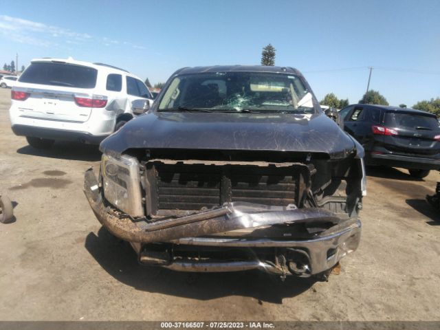 1N6AA1E5XKN530118 Nissan Titan Sl