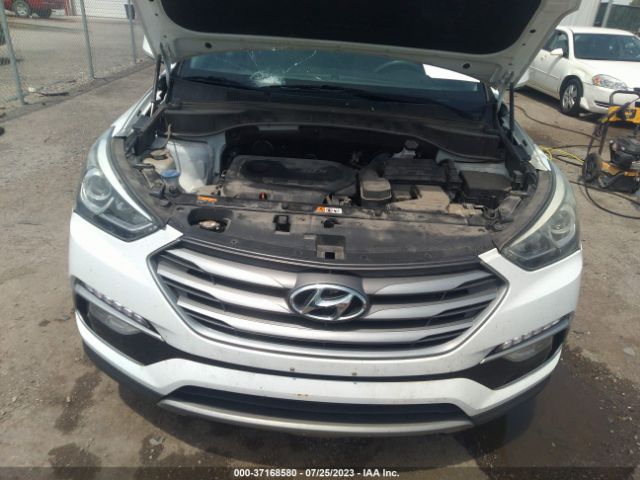 5NMZU3LB5HH022890 Hyundai Santa Fe Sport 2.4l