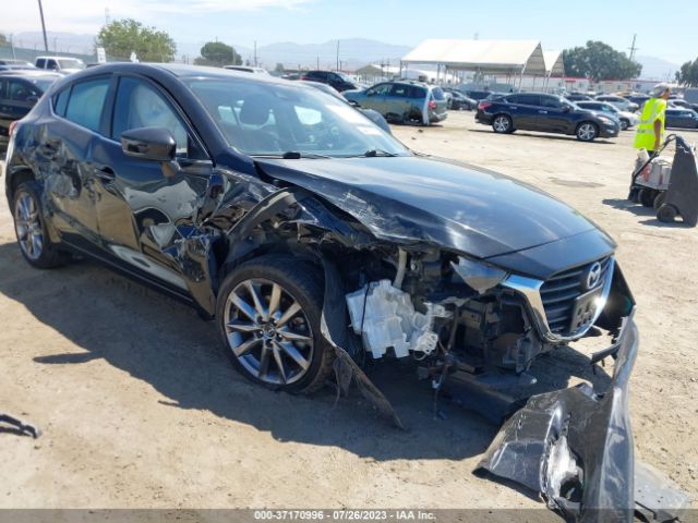 Mazda Mazda3 5-door Touring 2018 3MZBN1L39JM196229 Image 1
