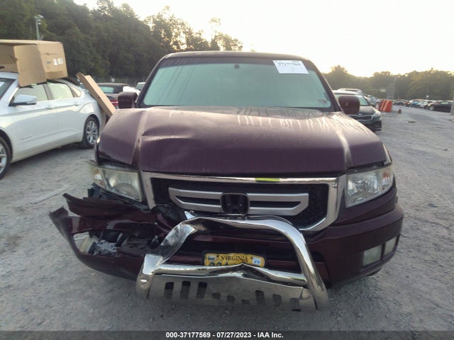 2011 HONDA RIDGELINE RTL VIN: 5FPYK1F50BB010352
