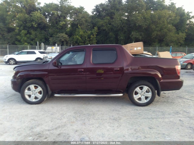 2011 HONDA RIDGELINE RTL VIN: 5FPYK1F50BB010352