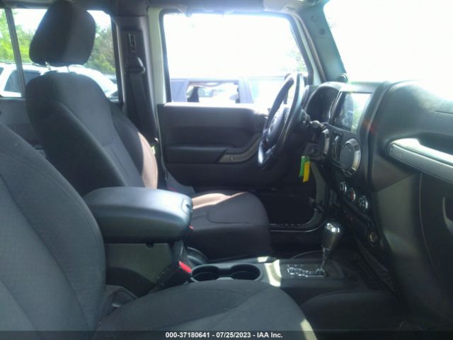 1C4BJWDG6EL313012 Jeep Wrangler Unlimited Sport