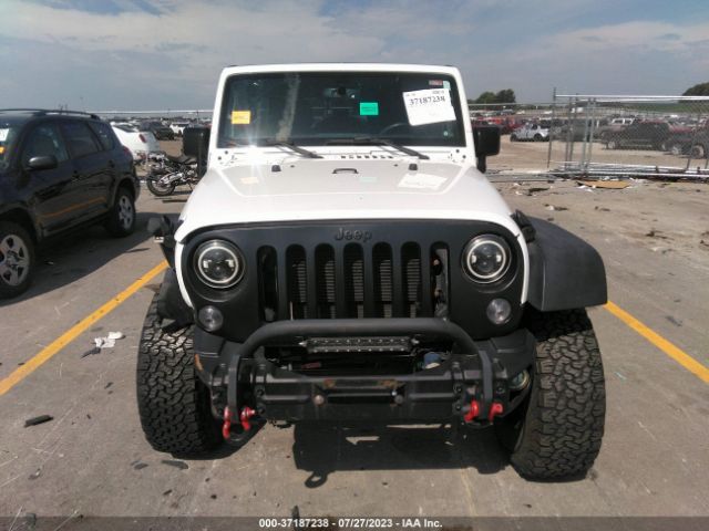1C4HJWDG5GL324001 Jeep Wrangler Unlimited Sport