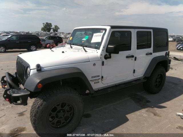 1C4HJWDG5GL324001 Jeep Wrangler Unlimited Sport