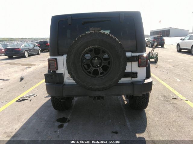 1C4HJWDG5GL324001 Jeep Wrangler Unlimited Sport