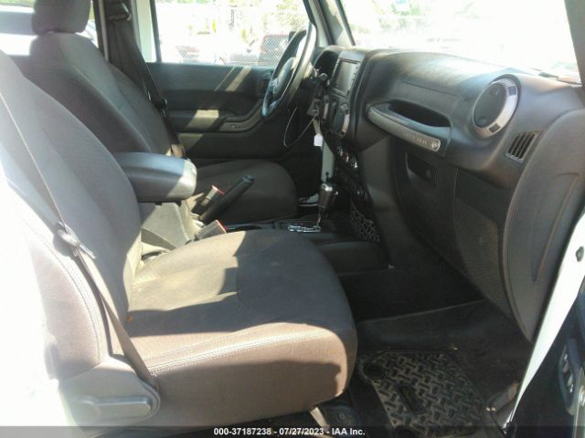 1C4HJWDG5GL324001 Jeep Wrangler Unlimited Sport