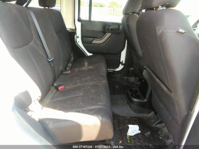 1C4HJWDG5GL324001 Jeep Wrangler Unlimited Sport
