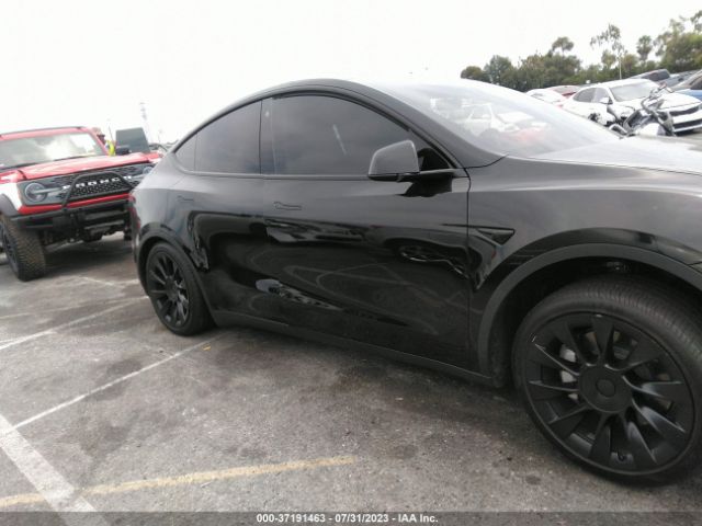 7SAYGDEE4PA031290 Tesla Model Y Long Range