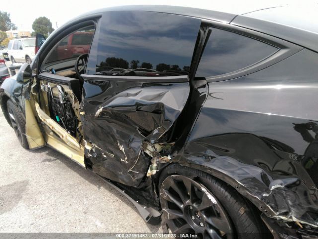 7SAYGDEE4PA031290 Tesla Model Y Long Range