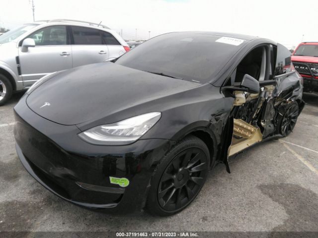 7SAYGDEE4PA031290 Tesla Model Y Long Range