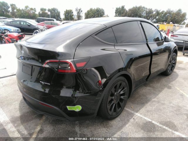 7SAYGDEE4PA031290 Tesla Model Y Long Range