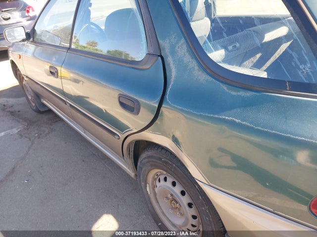 1996 SUBARU IMPREZA OUTBACK VIN: JF1GF4853TH814692