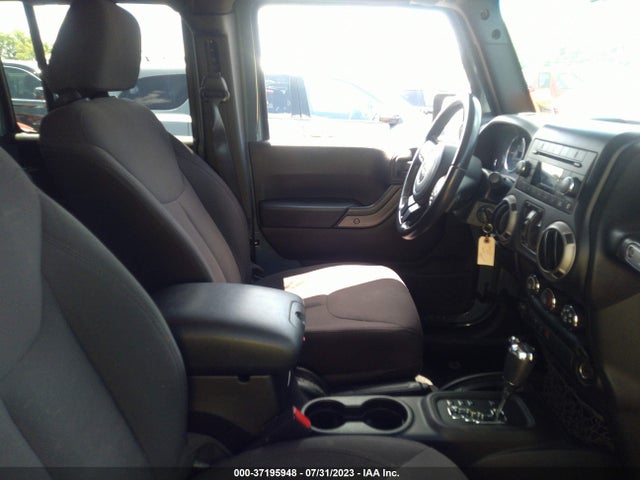 1C4BJWDG4FL619028 Jeep Wrangler Unlimited Sport