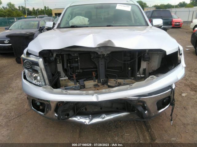1N6AA1E63HN547974 Nissan Titan Sl