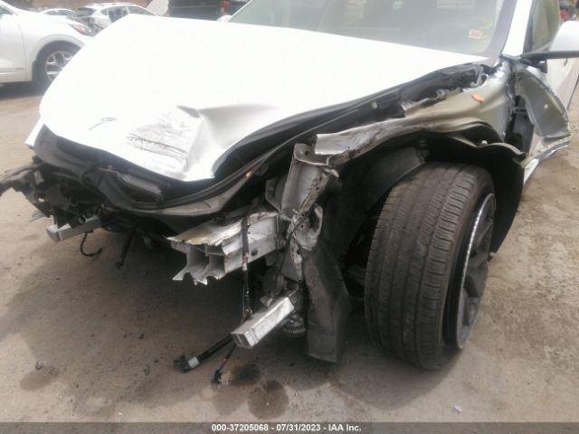 5YJ3E1EA3MF051621 Tesla Model 3 Standard Range Plus