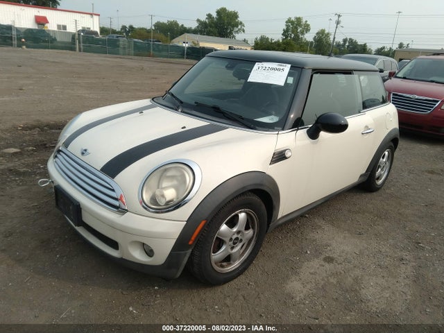 2010 MINI COOPER HARDTOP VIN: WMWMF3C52ATZ64895