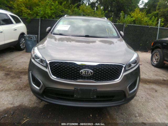 5XYPGDA34JG402335 KIA SORENTO LX