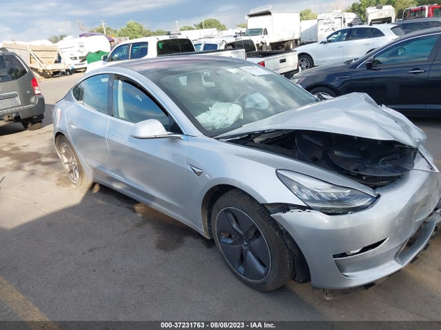 2018 Tesla 3, VIN: 5YJ3E1EA1JF016605