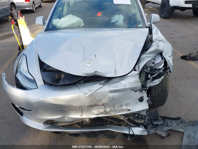 2018 Tesla 3, VIN: 5YJ3E1EA1JF016605