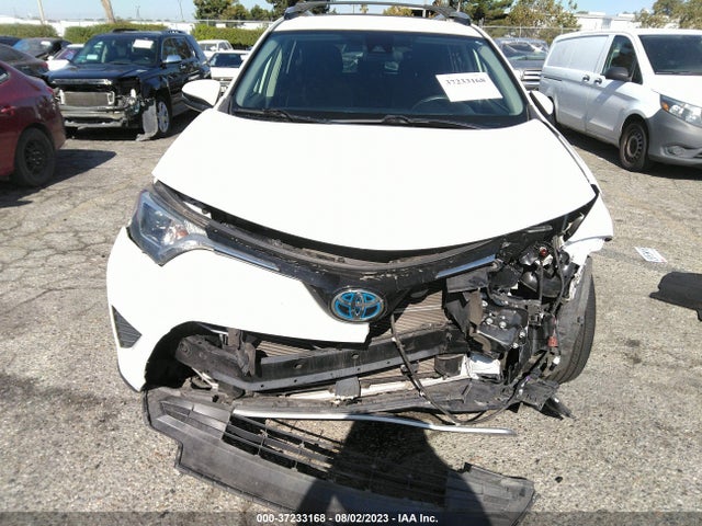 Toyota RAV4 HYBRID 2018 JTMRJREV4JD253149 Image 4